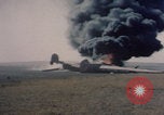 Image of Consolidated B-24 Liberator bomber burning Berca Airfield Benghazi Libya, 1943, second 26 stock footage video 65675080140