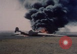 Image of Consolidated B-24 Liberator bomber burning Berca Airfield Benghazi Libya, 1943, second 30 stock footage video 65675080140