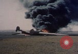 Image of Consolidated B-24 Liberator bomber burning Berca Airfield Benghazi Libya, 1943, second 31 stock footage video 65675080140