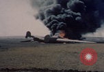 Image of Consolidated B-24 Liberator bomber burning Berca Airfield Benghazi Libya, 1943, second 34 stock footage video 65675080140