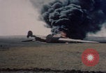 Image of Consolidated B-24 Liberator bomber burning Berca Airfield Benghazi Libya, 1943, second 36 stock footage video 65675080140