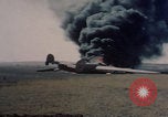 Image of Consolidated B-24 Liberator bomber burning Berca Airfield Benghazi Libya, 1943, second 37 stock footage video 65675080140