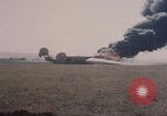 Image of Consolidated B-24 Liberator bomber burning Berca Airfield Benghazi Libya, 1943, second 39 stock footage video 65675080140