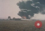 Image of Consolidated B-24 Liberator bomber burning Berca Airfield Benghazi Libya, 1943, second 41 stock footage video 65675080140
