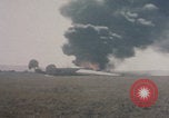 Image of Consolidated B-24 Liberator bomber burning Berca Airfield Benghazi Libya, 1943, second 42 stock footage video 65675080140