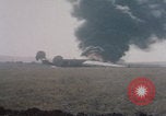 Image of Consolidated B-24 Liberator bomber burning Berca Airfield Benghazi Libya, 1943, second 44 stock footage video 65675080140