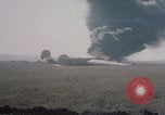 Image of Consolidated B-24 Liberator bomber burning Berca Airfield Benghazi Libya, 1943, second 46 stock footage video 65675080140