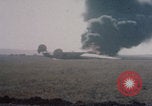 Image of Consolidated B-24 Liberator bomber burning Berca Airfield Benghazi Libya, 1943, second 47 stock footage video 65675080140