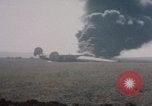 Image of Consolidated B-24 Liberator bomber burning Berca Airfield Benghazi Libya, 1943, second 48 stock footage video 65675080140