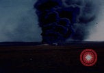 Image of Consolidated B-24 Liberator bomber burning Berca Airfield Benghazi Libya, 1943, second 52 stock footage video 65675080140
