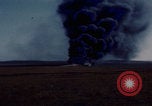 Image of Consolidated B-24 Liberator bomber burning Berca Airfield Benghazi Libya, 1943, second 55 stock footage video 65675080140