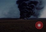 Image of Consolidated B-24 Liberator bomber burning Berca Airfield Benghazi Libya, 1943, second 56 stock footage video 65675080140