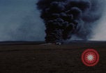 Image of Consolidated B-24 Liberator bomber burning Berca Airfield Benghazi Libya, 1943, second 57 stock footage video 65675080140