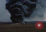 Image of Consolidated B-24 Liberator bomber burning Berca Airfield Benghazi Libya, 1943, second 58 stock footage video 65675080140