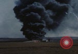 Image of Consolidated B-24 Liberator bomber burning Berca Airfield Benghazi Libya, 1943, second 59 stock footage video 65675080140