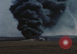 Image of Consolidated B-24 Liberator bomber burning Berca Airfield Benghazi Libya, 1943, second 60 stock footage video 65675080140