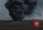 Image of Consolidated B-24 Liberator bomber burning Berca Airfield Benghazi Libya, 1943, second 61 stock footage video 65675080140