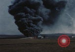 Image of Consolidated B-24 Liberator bomber burning Berca Airfield Benghazi Libya, 1943, second 62 stock footage video 65675080140