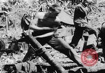 Image of 81st Infantry Division troops attack Suicide Hill on Angaur Angaur Palau Islands, 1944, second 13 stock footage video 65675080168