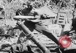 Image of 81st Infantry Division troops attack Suicide Hill on Angaur Angaur Palau Islands, 1944, second 15 stock footage video 65675080168
