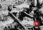 Image of 81st Infantry Division troops attack Suicide Hill on Angaur Angaur Palau Islands, 1944, second 18 stock footage video 65675080168