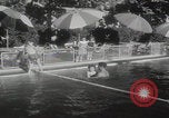 Image of US Army families swim and play golf Tehran Iran, 1956, second 32 stock footage video 65675080211