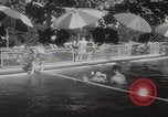 Image of US Army families swim and play golf Tehran Iran, 1956, second 33 stock footage video 65675080211