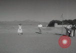 Image of US Army families swim and play golf Tehran Iran, 1956, second 41 stock footage video 65675080211