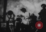 Image of Hippies play music United States USA, 1969, second 9 stock footage video 65675080245
