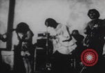Image of Hippies play music United States USA, 1969, second 10 stock footage video 65675080245