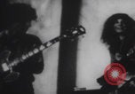 Image of Hippies play music United States USA, 1969, second 25 stock footage video 65675080245