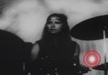 Image of Hippies play music United States USA, 1969, second 27 stock footage video 65675080245