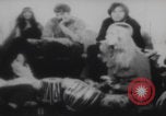 Image of Hippies play music United States USA, 1969, second 36 stock footage video 65675080245
