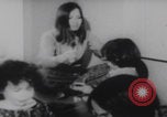 Image of Hippies play music United States USA, 1969, second 40 stock footage video 65675080245