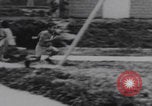 Image of children playground India, 1970, second 4 stock footage video 65675080249