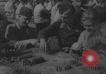 Immagine di I ragazzi di Hitler assemblano le candele Germania, 1940, secondo 36 filmato di repertorio 65675080265