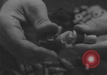 Immagine di I ragazzi di Hitler assemblano le candele Germania, 1940, secondo 58 filmato di repertorio 65675080265
