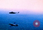 Image of US Army doctors treating leg Vietnam, 1967, second 1 stock footage video 65675080307