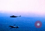 Image of US Army doctors treating leg Vietnam, 1967, second 3 stock footage video 65675080307