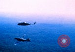 Image of US Army doctors treating leg Vietnam, 1967, second 4 stock footage video 65675080307