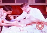 Image of US Army doctors treating leg Vietnam, 1967, second 6 stock footage video 65675080307