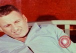 Image of US Army doctors treating leg Vietnam, 1967, second 11 stock footage video 65675080307