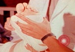 Image of US Army doctors treating leg Vietnam, 1967, second 13 stock footage video 65675080307