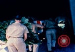 Image of US Army doctors treating leg Vietnam, 1967, second 32 stock footage video 65675080307