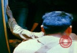 Image of US Army doctors treating leg Vietnam, 1967, second 42 stock footage video 65675080307