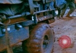 Image of US Army doctors treating leg Vietnam, 1967, second 47 stock footage video 65675080307