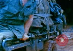 Image of US Army doctors treating leg Vietnam, 1967, second 48 stock footage video 65675080307