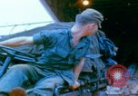 Image of US Army doctors treating leg Vietnam, 1967, second 49 stock footage video 65675080307