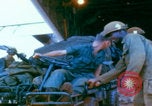 Image of US Army doctors treating leg Vietnam, 1967, second 51 stock footage video 65675080307