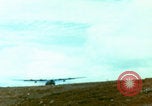 Image of US Army doctors treating leg Vietnam, 1967, second 53 stock footage video 65675080307
